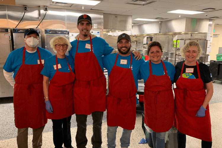Jess Berrios, second from far right, recently helped serve meals at St. Anthony's in San Francisco along with PG&E coworkers.